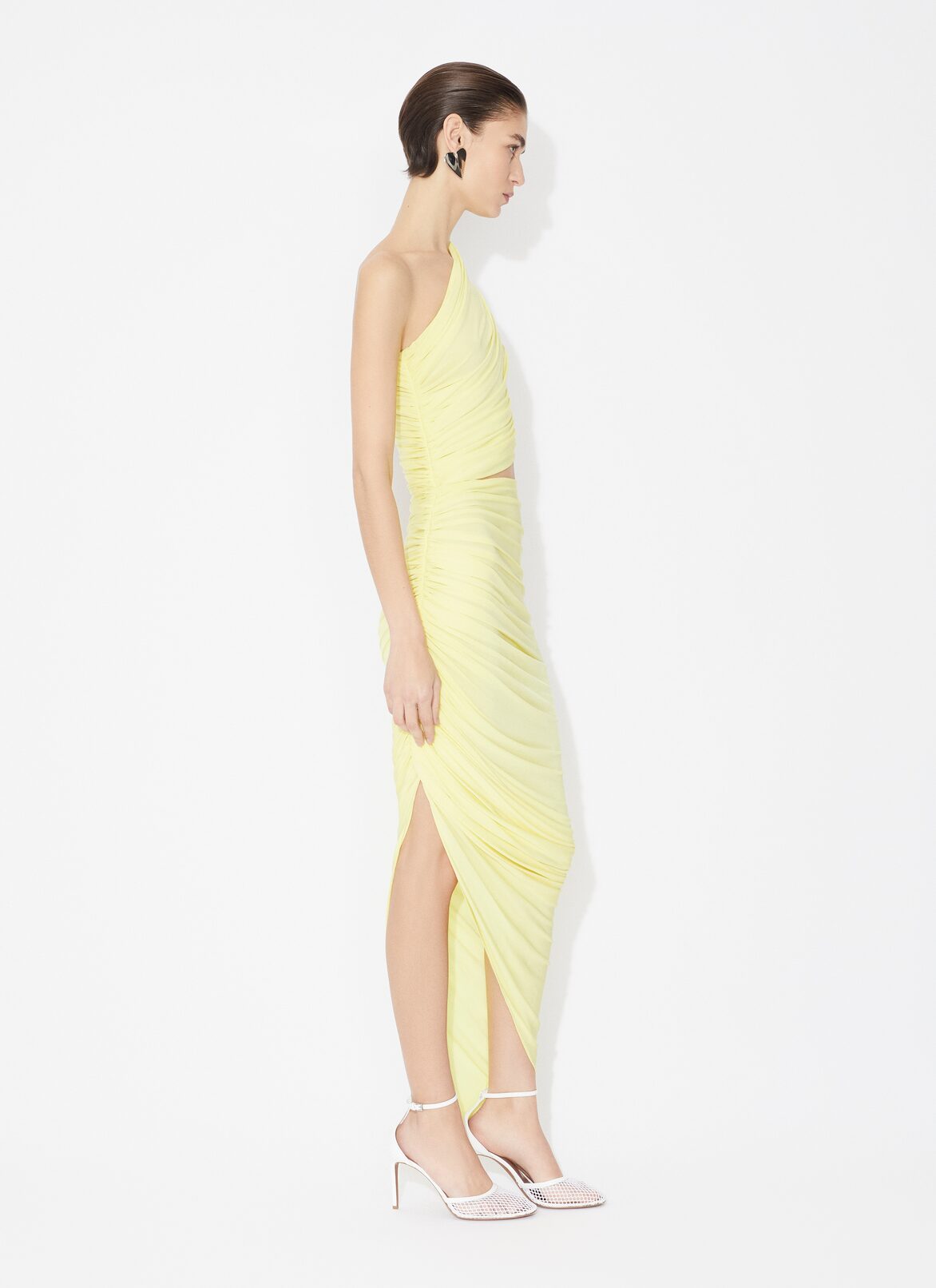 ASYMMETRICAL SECOND SKIN CUT-OUT DRESS ALAÏA LIGHT YELLOW ASYMMETRICAL SECOND SKIN CUT-OUT DRESS